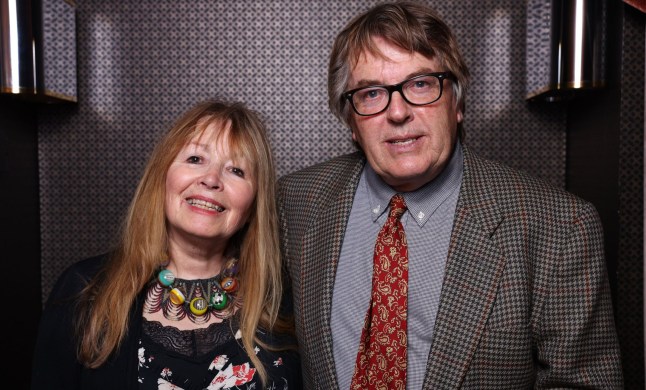 Mary Killen and Giles Wood pose together in formal clothing