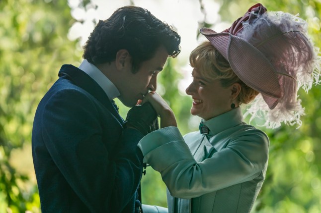 The Gilded Age still from season three of a man kissing a woman's hand
